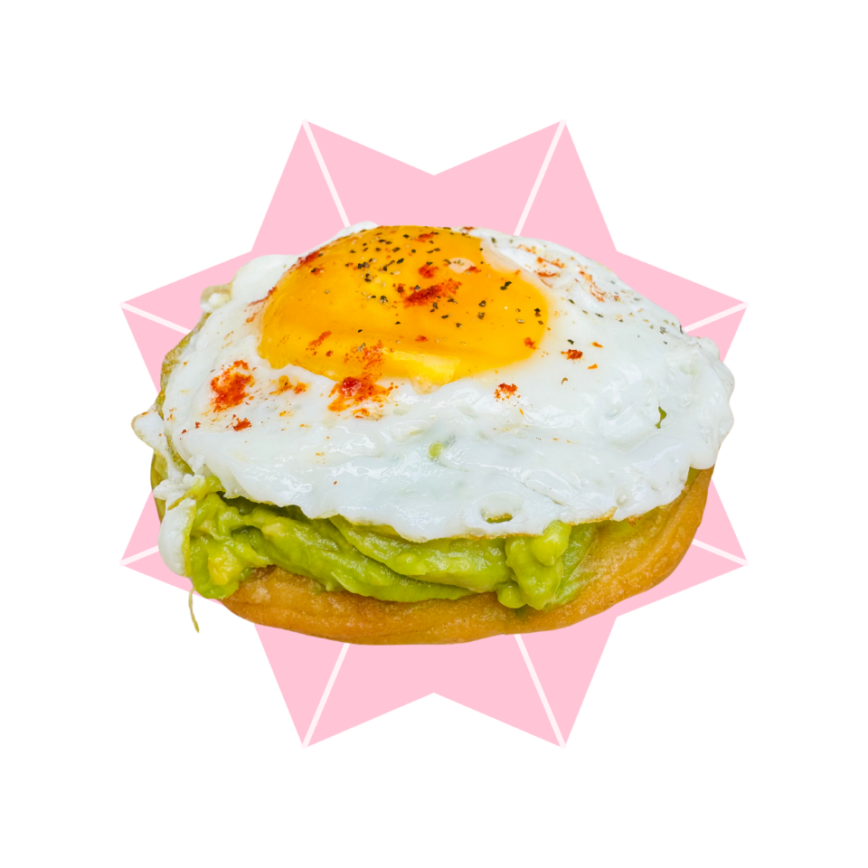 churro, mashed avocado and  fried egg dishe